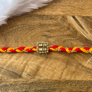 Beautiful Mauli Rakhi with Booti