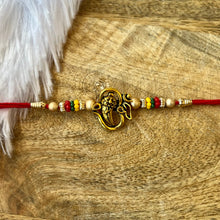 Load image into Gallery viewer, Smart OM Ganesha Bhai Rakhi
