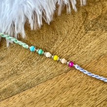 Load image into Gallery viewer, Multicoloured Sleek Twisted Rakhi
