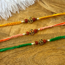 Load image into Gallery viewer, Vibrant Om Trishul Rudraksh Rakhi
