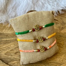 Load image into Gallery viewer, Vibrant Om Trishul Rudraksh Rakhi

