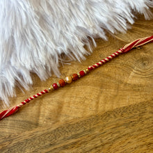 Load image into Gallery viewer, Beautifully Knotted Rudraksh Rakhi
