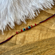 Load image into Gallery viewer, Delicate Rudraksh  Evil Eye Rakhi
