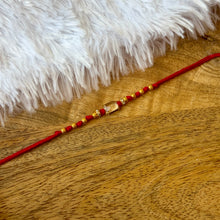 Load image into Gallery viewer, Sleek Glass Frame Rakhi
