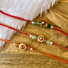 Load image into Gallery viewer, Delicate Kundan Meena Rakhi
