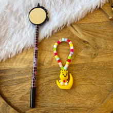 Load image into Gallery viewer, Vibrant Teddy Bracelet with Pen &amp; a Cap Holder
