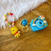 Load image into Gallery viewer, Vibrant Winnie the Pooh Bracelet with Blue Projector Keychain
