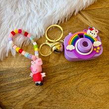 Load image into Gallery viewer, Vibrant Winnie the Pooh Bracelet with Blue Projector Keychain
