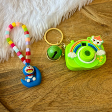 Load image into Gallery viewer, Vibrant Winnie the Pooh Bracelet with Blue Projector Keychain
