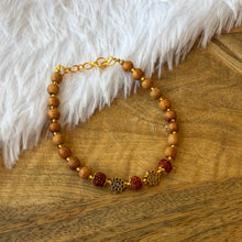 Load image into Gallery viewer, Om Sathiya Rudraksh Bracelet with Chandan Beads
