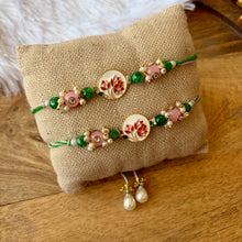 Load image into Gallery viewer, Stunning Pichhwai Lotus Braclet and Bhai Rakhi Pair
