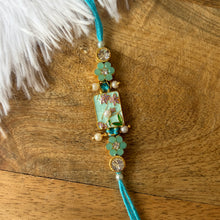 Load image into Gallery viewer, Elegant Floral Rakhi
