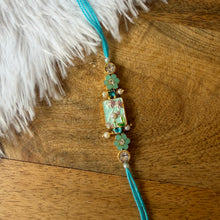 Load image into Gallery viewer, Elegant Floral Rakhi

