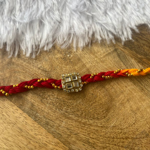 Beautiful Mauli Rakhi with Booti