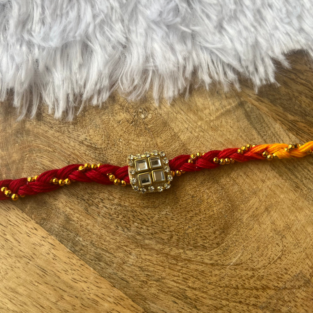 Beautiful Mauli Rakhi with Booti
