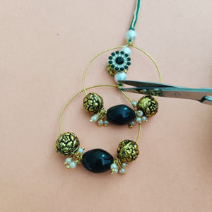 Trendy Lumba rakhi with natural real  green agate stone. The lumba can be worn as ear rings later on.