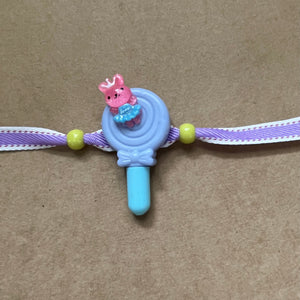 Cute Candy(with Pen) Kids Rakhi (Mixed Colors)